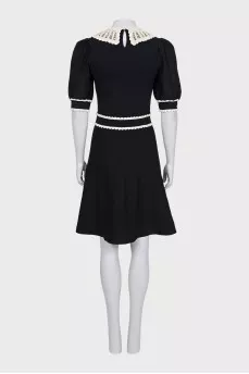 Black fitted dress with lace trim