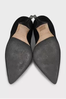 Black suede pumps