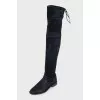 Black suede over-the-knee boots with laces