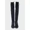 Black suede over-the-knee boots with laces