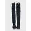 Black suede over-the-knee boots with laces