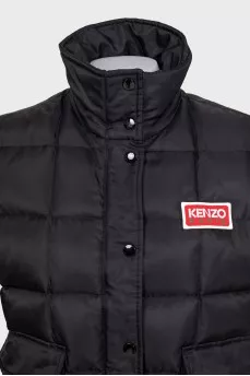 Black vest with logo patch
