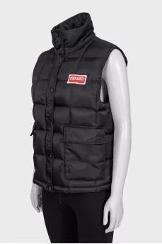 Black vest with logo patch