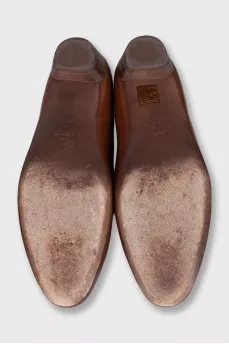 Brown leather shoes with stacked heels