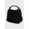 Velvet bag with accent handle
