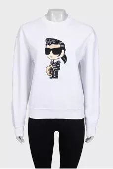 White sweatshirt with a patch