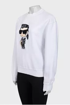 White sweatshirt with a patch