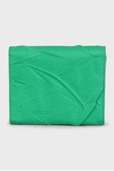 Textile wallet with a button