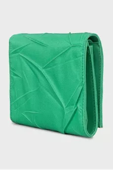 Textile wallet with a button