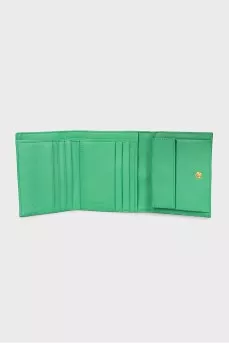 Textile wallet with a button