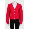 Red cardigan with silver buttons