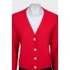 Red cardigan with silver buttons