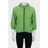 Green windbreaker with short sleeves