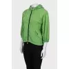 Green windbreaker with short sleeves