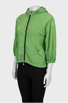 Green windbreaker with short sleeves