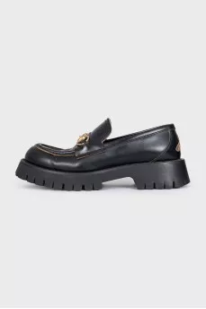 Black leather loafers with embroidery