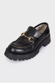 Black leather loafers with embroidery