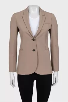 Beige jacket with branded buttons