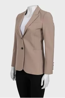 Beige jacket with branded buttons