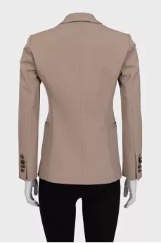 Beige jacket with branded buttons