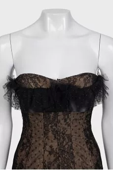 Lace corset top decorated with a bow