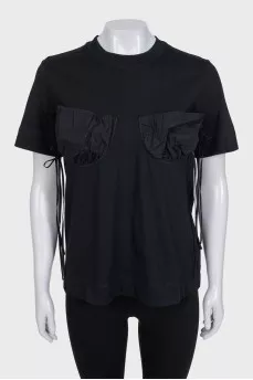 Black t-shirt with accent pockets and tag