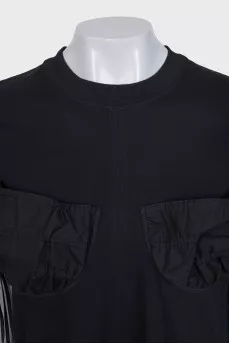 Black t-shirt with accent pockets and tag