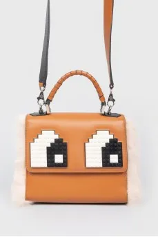 Brown bag with fur and Lego inserts