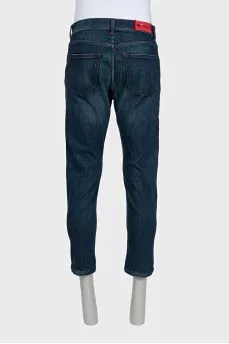 Men's blue jeans with bright buttons