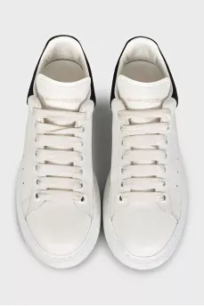 White sneakers with a logo