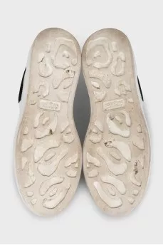White sneakers with a logo
