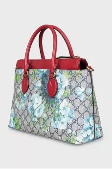 Canvas and leather bag with floral print