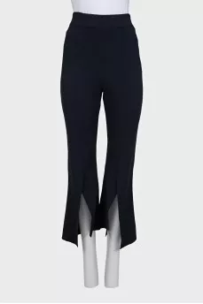 Blue flared trousers with slits in the legs
