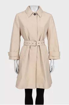 Beige fitted trench coat with belt