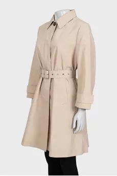 Beige fitted trench coat with belt