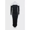 Black off-the-shoulder dress with tag