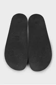 Black rubber flip-flops
