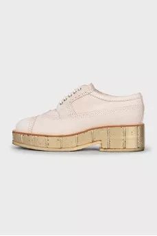 Leather derby shoes with gold soles