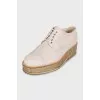 Leather derby shoes with gold soles