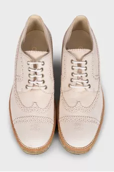Leather derby shoes with gold soles