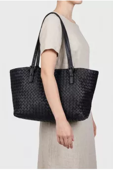 Woven leather bag with two handles