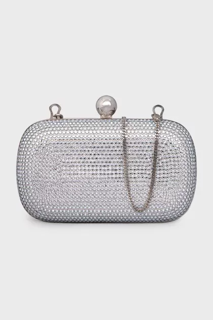 Clutch on a chain decorated with crystals