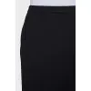 Asymmetrical wool skirt with a slit