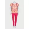 Pink suit with a silk blouse