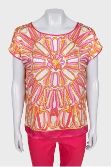 Pink suit with a silk blouse