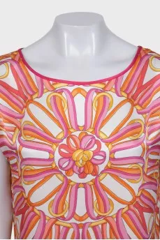 Pink suit with a silk blouse