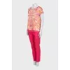 Pink suit with a silk blouse