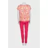 Pink suit with a silk blouse