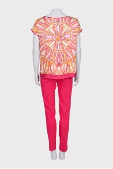 Pink suit with a silk blouse