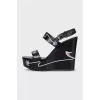Black leather wedge sandals